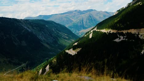 scenic mountain road winding through a valley