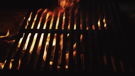 The-fire-burns-under-the-hot-grill-grill