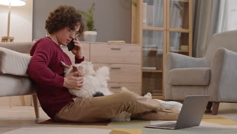 busy young man and dog