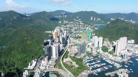 aberdeen harbour and skyline in southwest hong kong island on a beautiful day, aerial view