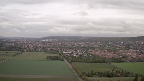 Moody-Drone-Aerial-Shot-of-Göttingen-in-Germany-in-late-autumn-in-beautiful-orange-and-yellow-colors