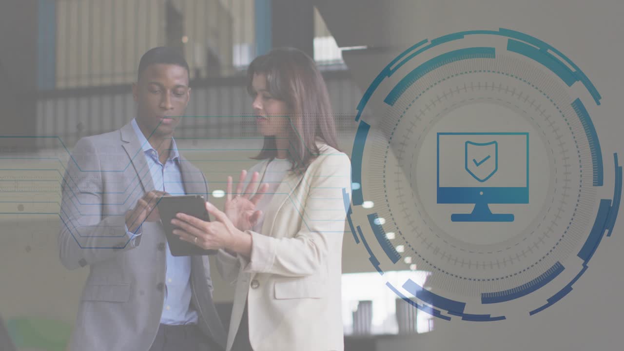 Man tapping tablet with woman gesturing initiating security monitor icon shield or checkmark overlay