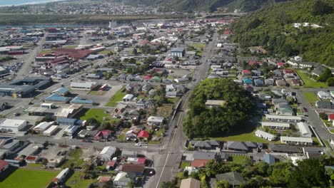 Light-car-traffic-on-road-in-Greymouth-town,-West-Coast