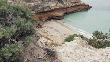 reveal of an empty sand beach in ibiza