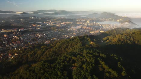 Sun-cloud-covered-sky-over-hill-mountains-Donastia-San-Sebastian-Spain