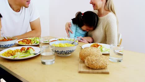 happy family having meal