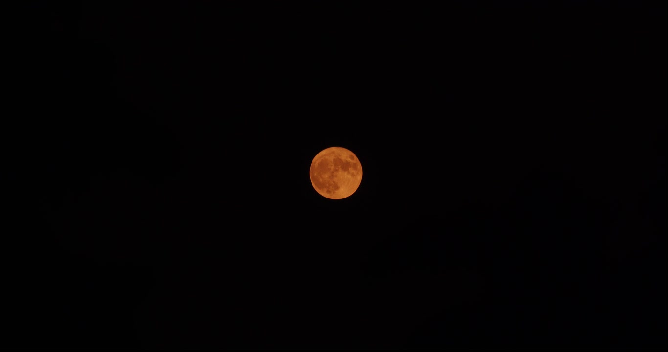 Wide shot of a Harvest Moon