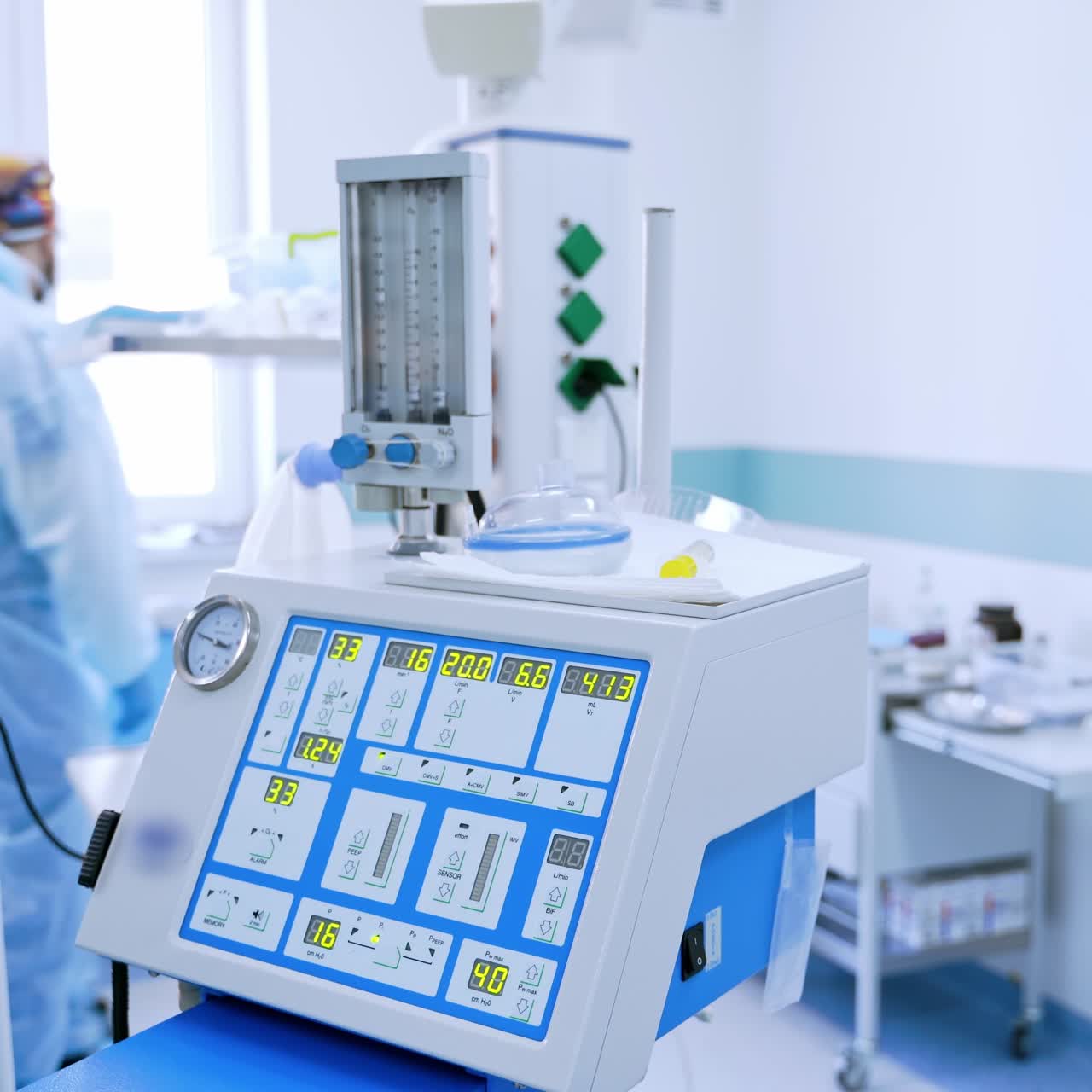 Artificial lungs ventilation apparatus in the emergency room. Modern medical equipment for saving patient's life during pandemic. Covid-19, coronavirus concept.