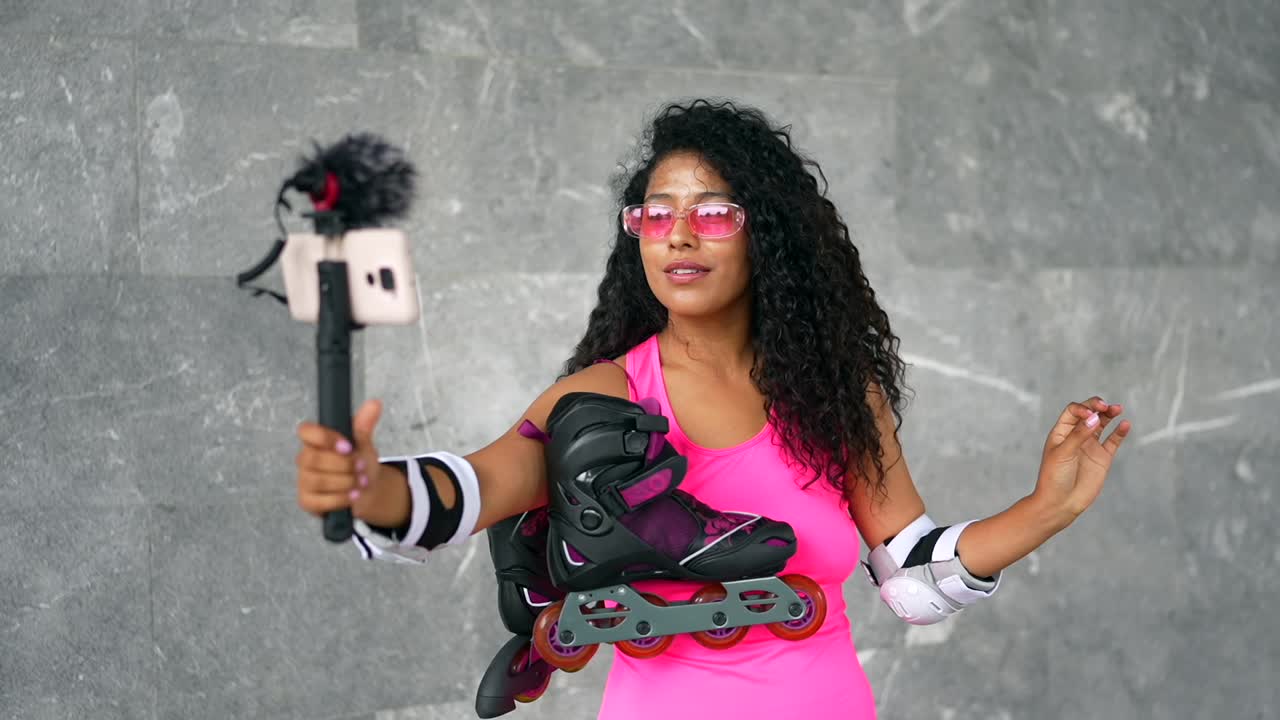 Woman roller skating and vlogging