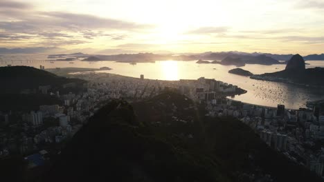 Establishing-drone-shot-of-downtown-Rio-de-Janeiro,-sunset-in-Brazil,-South-America