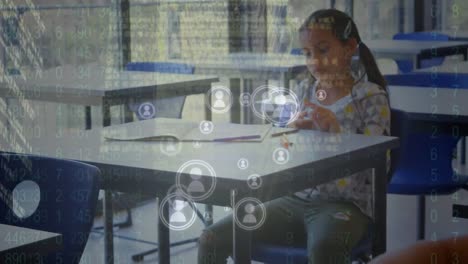 Animation-of-profile-icons-and-data-processing-over-two-diverse-girls-studying-in-class-at-school