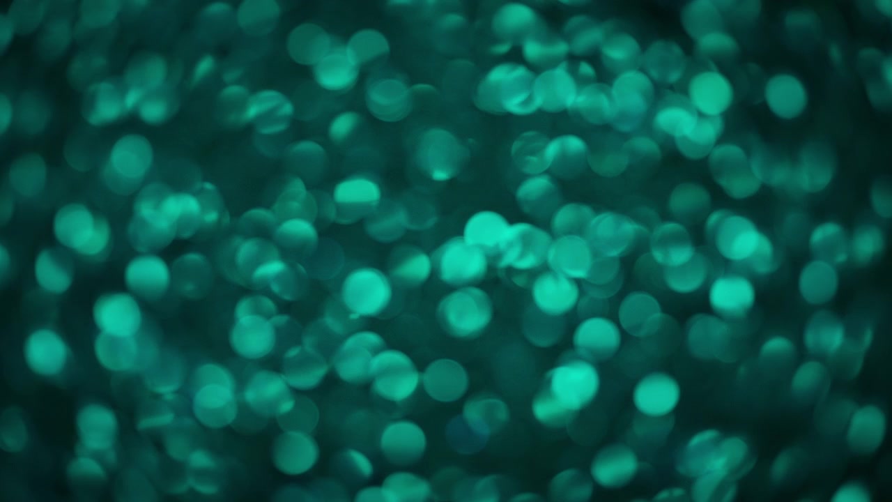 Parlayan turkuaz simlerin soyut bokeh arka planı