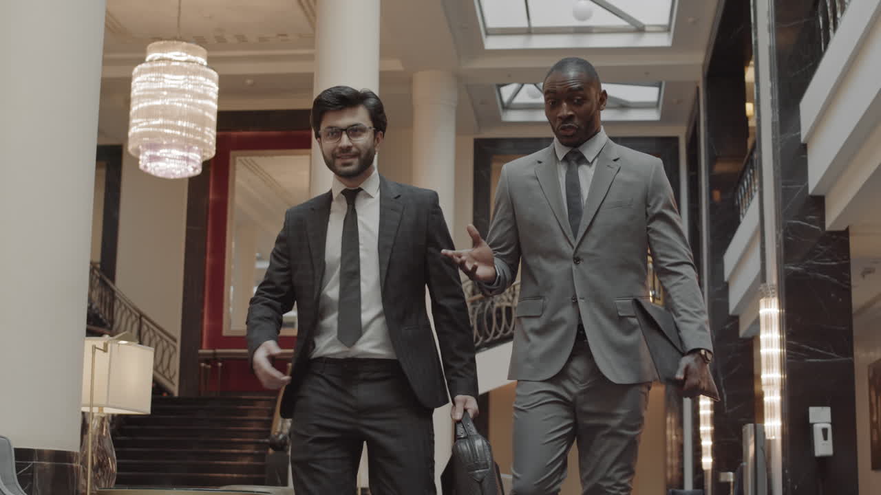 Business Partners Walking and Shaking Hands