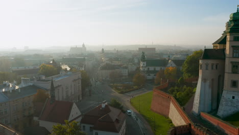 foggy, autumn morning over old town, kazimierz and stradom district in krakow