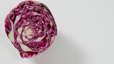 half red or purple cabbage on white background 4k 4k