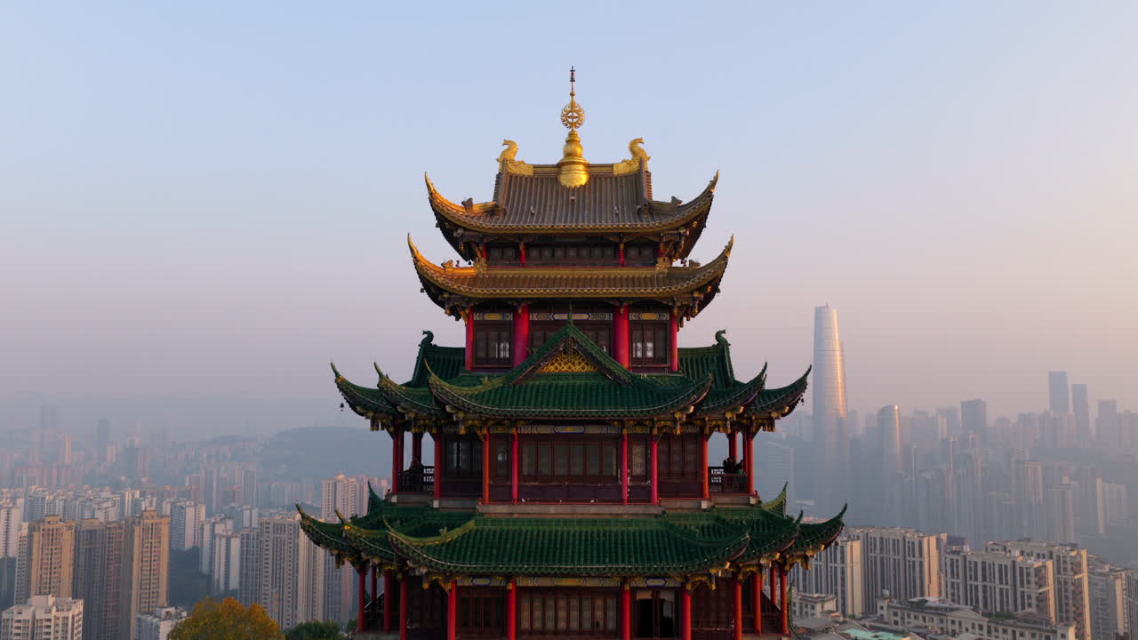 Hong'en Pavilion With Antique-style Building At Sunset In Chongqing, China. - aerial pullback shot
