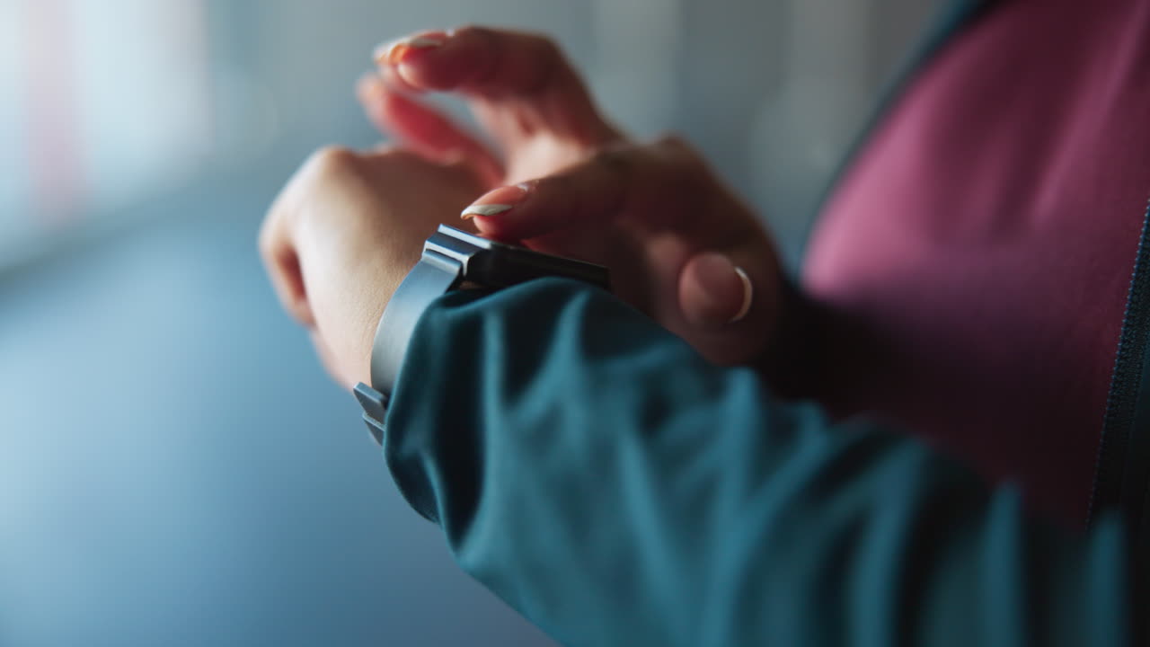 Close-up of a person using a smartwatch