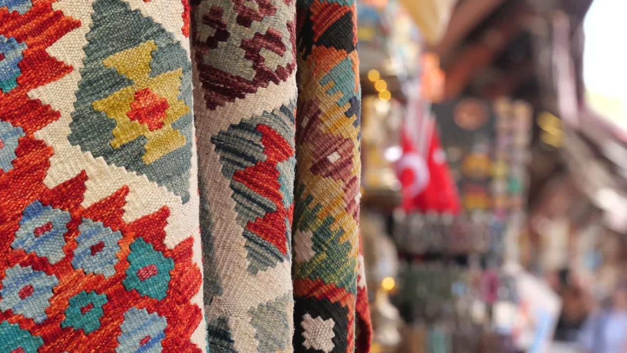 Display of Colorful Rugs at a Market