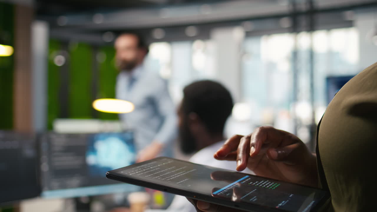 Close Up Of Engineer Using Tablet To Write Code, Developing Machine Learning Api