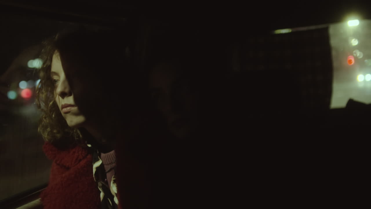 Girlfriends Riding in Car in Night City