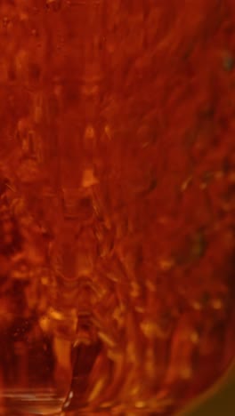 close up of orange juice in a glass