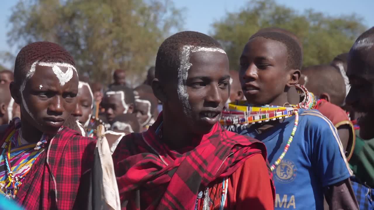 Maasai Boys Singing and Celebrating in Traditional Ceremony