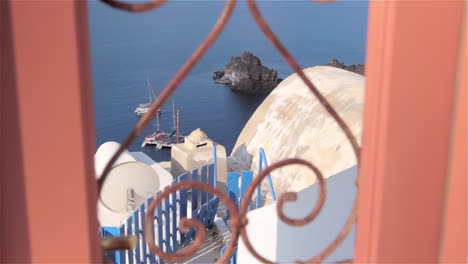 tracking past windows overlooking greek coast