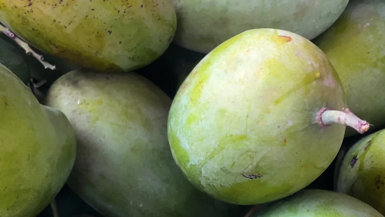 Macro Shot Of Organic Green Fresh Mango Pile