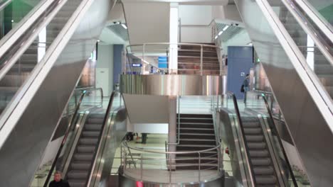 modern building interior with escalators and stairways