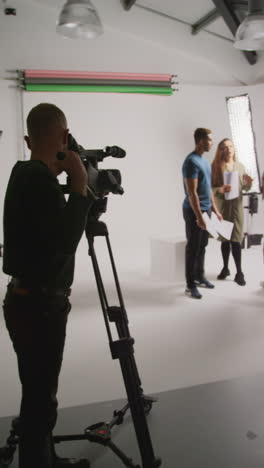 film crew shooting a scene in a studio