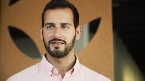 Front-view-of-handsome-young-man-talking