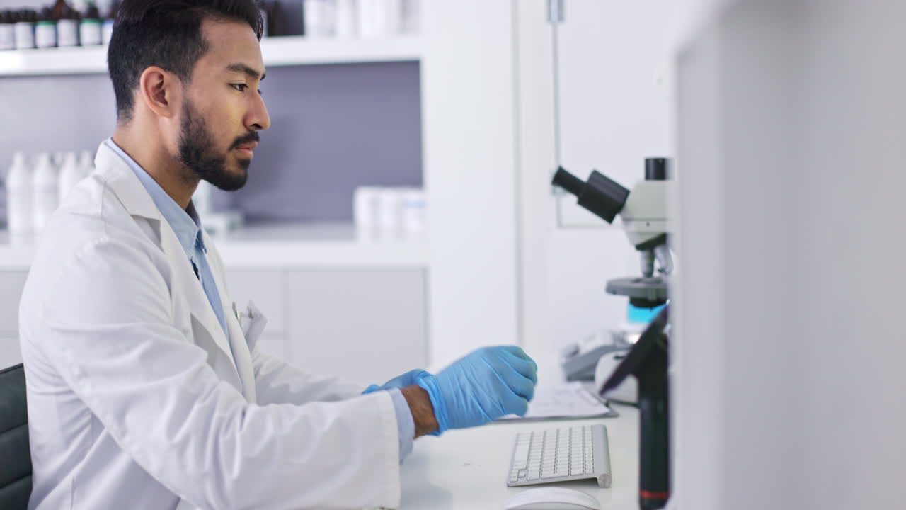 Scientist at computer screen