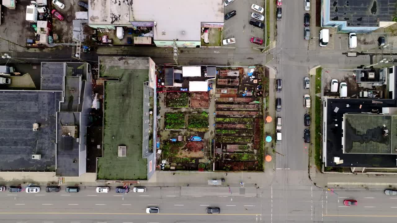 Top View Of Urban Community Garden Along East Hastings Street In Vancouver, BC, Canada. aerial shot