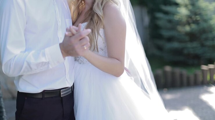 Bride And Groom Hugging. Happy bride and groom outdoor in nature location