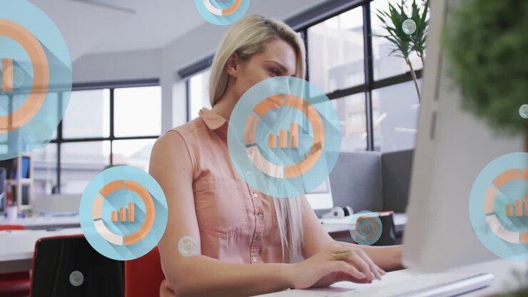 Animation of multiple bar graph icons floating against caucasian woman smiling at office