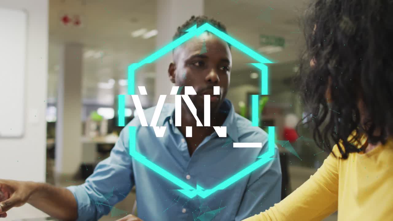 Animation of nft over diverse female and male coworkers in office