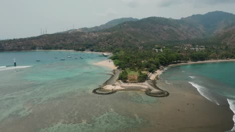 beautiful tanjungan pantai senggigi beach during low tide in lombok, aerial