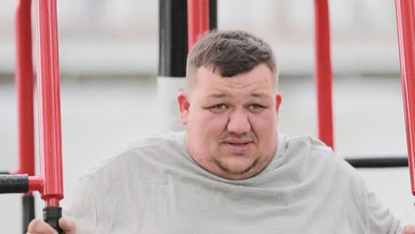 closeup of an overweight guy doing sports fat people sports motivation closeup of an overweight guy doing sports fat people sports motivation