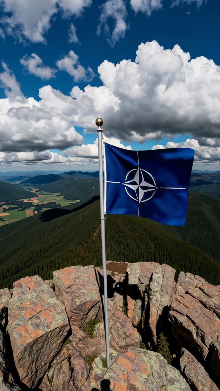 NATO Flag on Mountain Peak