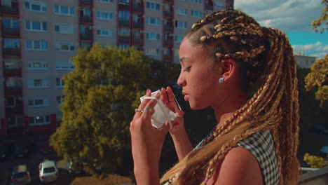 Young-Mixed-Race-Girl-in-Outdoors-Putting-Face-Mask-During-Corona-Virus-Outbreak-and-Quarantine