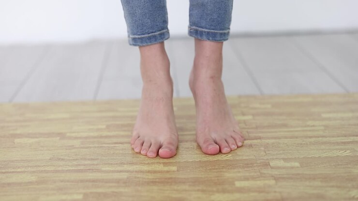 Bare feet on wood floor