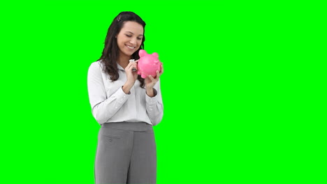 a woman holding a piggybank