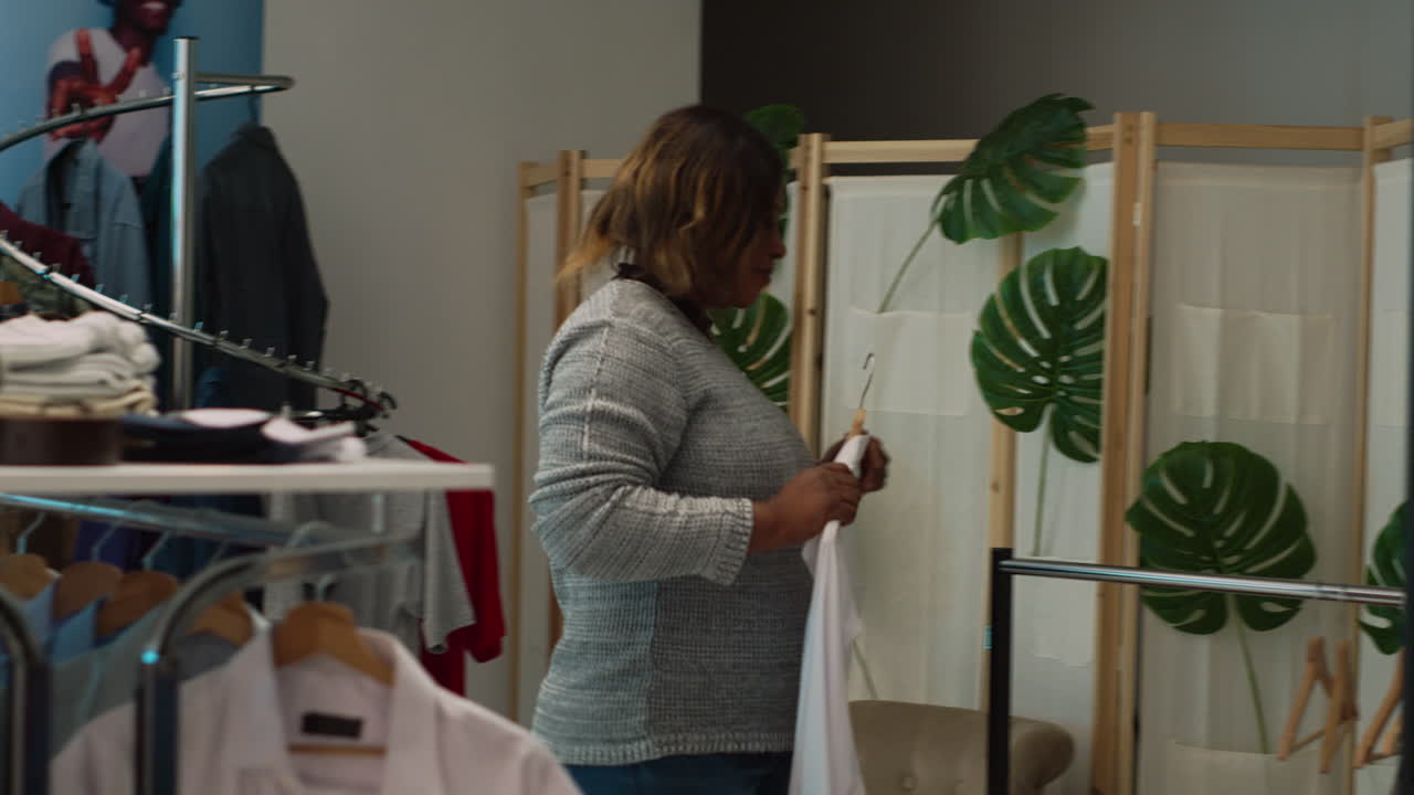 People shopping for clothes at a fashion store