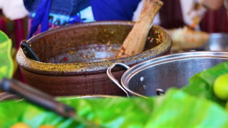 preparing traditional papaya salad in bangkok, thailand