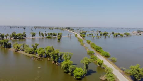 Aerial-Flying-Over-Submerged-Land-Due-To-Flooding-In-Mehar,-Sindh