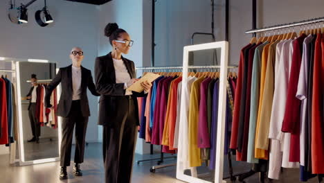 fashion professionals inspecting inventory