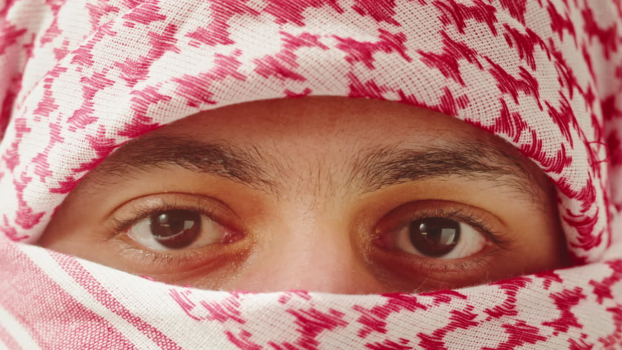 Close-up Portrait of a Man Wearing a Keffiyeh
