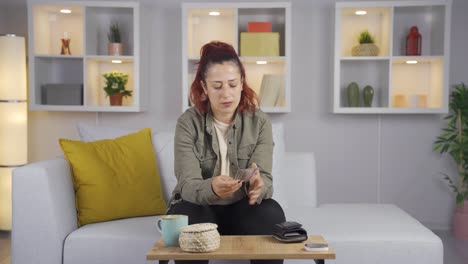 woman saving money in piggy bank.