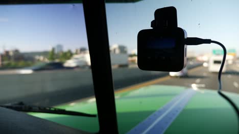 Trucker-Wears-Mask,-Truck-on-the-road-cutaway