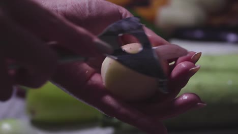 Women's hands wash, peel and cut vegetables into vegetable stew